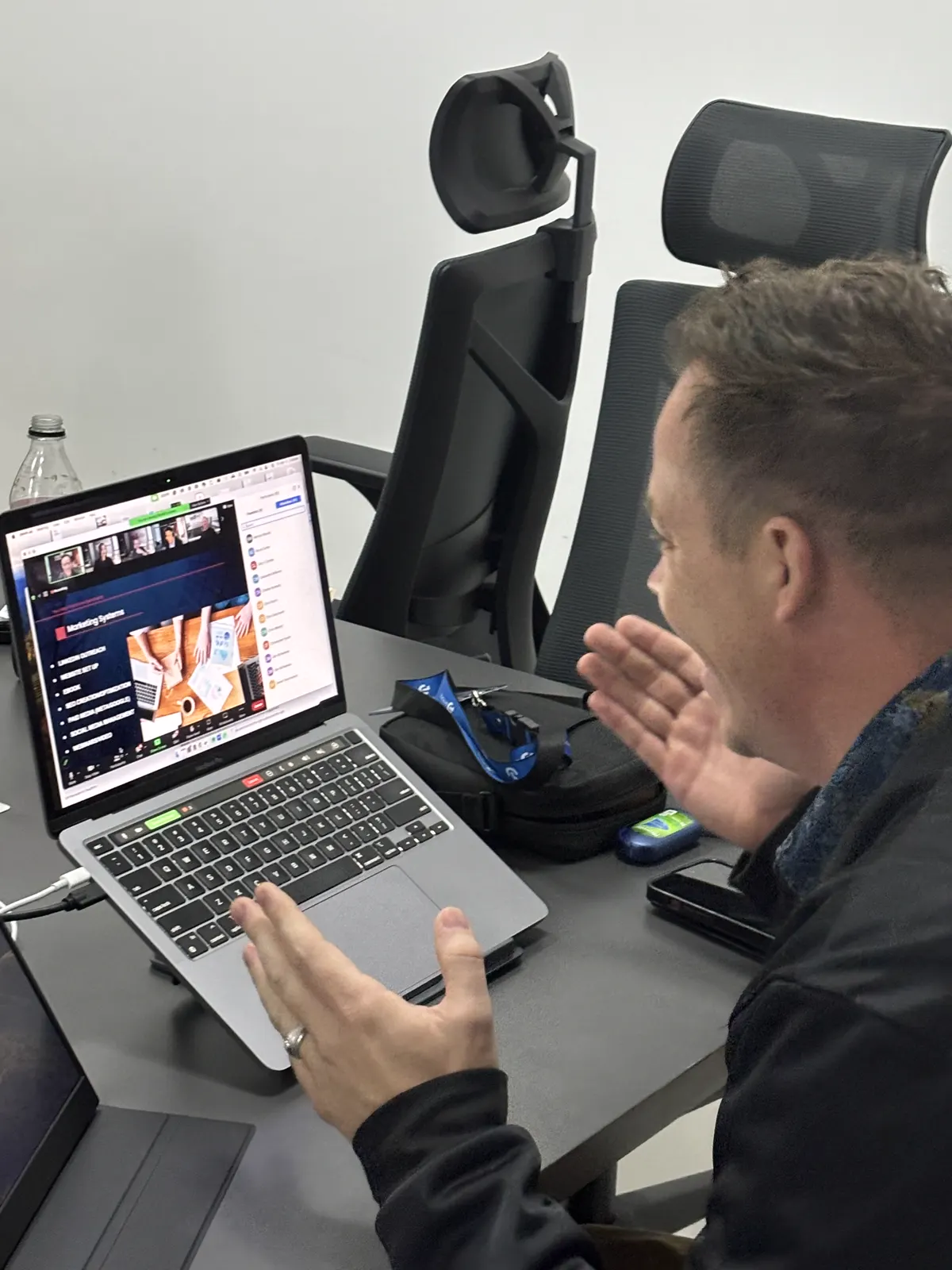 A video call on a laptop in the office meeting room